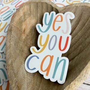 A sticker that says yes you can on it.